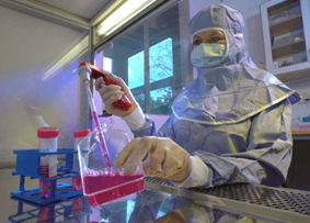 Lab person in a cleanroom